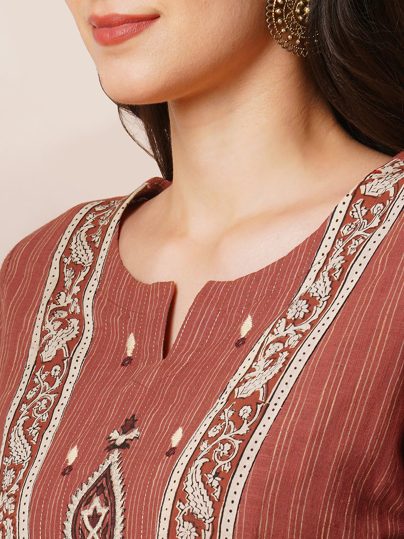 Straight kurta in striped cotton fabric with block printed yoke.