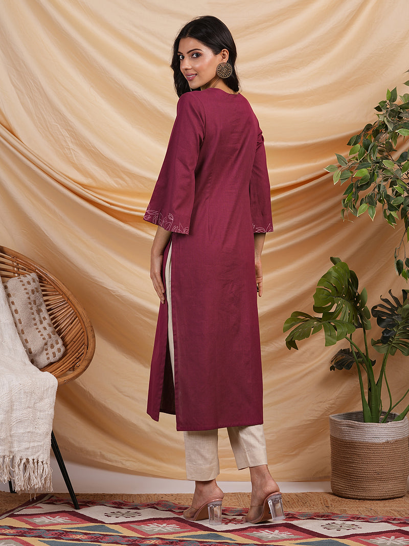 Straight kurta with minimal computer embroidery enhanced with mirror.