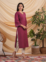 Straight kurta with minimal computer embroidery enhanced with mirror.