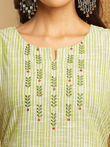 Straight cotton kurta with mirror and embroidery details on yoke.