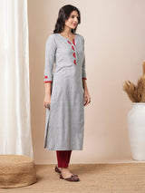 Straight fit pin stripped kurta with applique work and bead works.