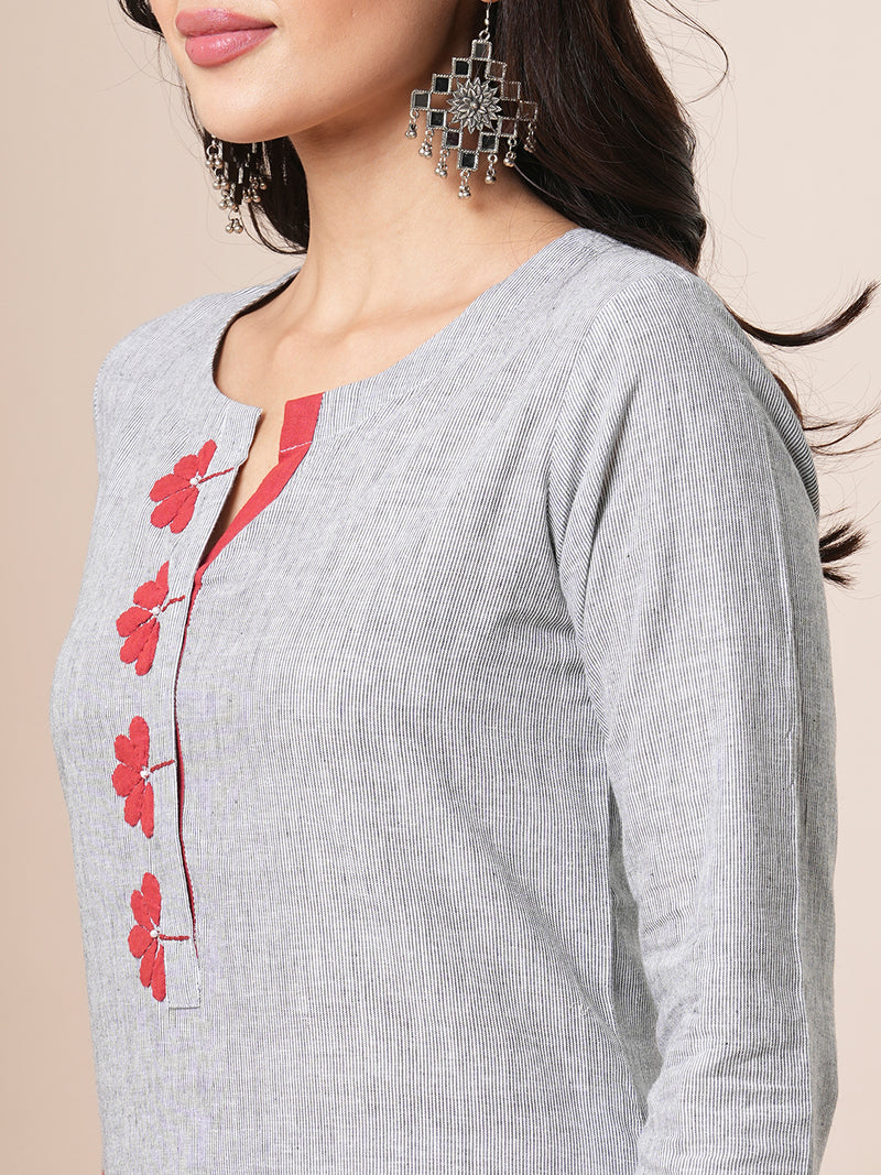 Straight fit pin stripped kurta with applique work and bead works.