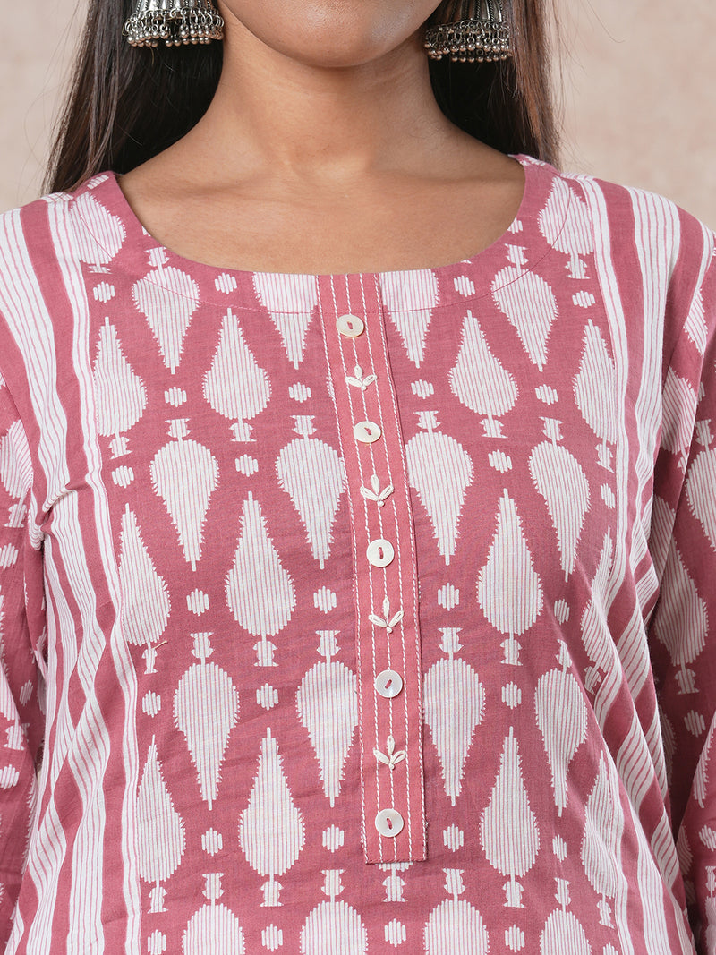 Staright mix-n-match printed cotton kurta with shell button detailing's on placket.