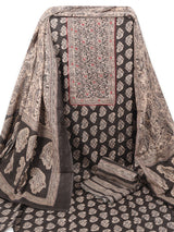 A black classic paisley-printed unstitched suit set with a mix-and-match yoke and contrasting-coloured handwork.