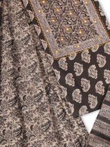 A black classic paisley-printed unstitched suit set with a mix-and-match yoke and contrasting-coloured handwork.