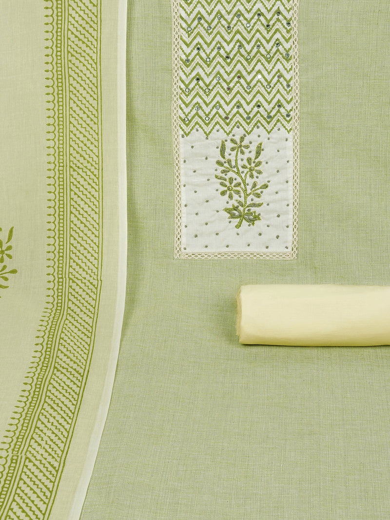 Green Unstitched suit set featuring intricate khat work, and lace embellishments.