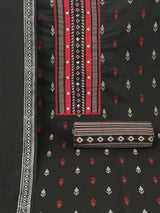 Black unstitched suit set with a block-printed dupatta and mix-match yoke.