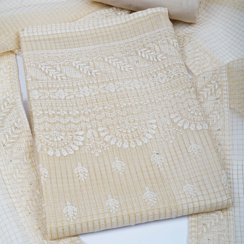 Unstitched chikankari suit set with kota-doria dupatta and plain bottom.