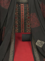 Maroon unstitched suit set with original ajrak print mix-match yoke and intricate detailed of handwork.