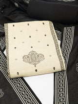 Unstitched suit set featuring block prints, complemented by a mul dupatta and bottoms.