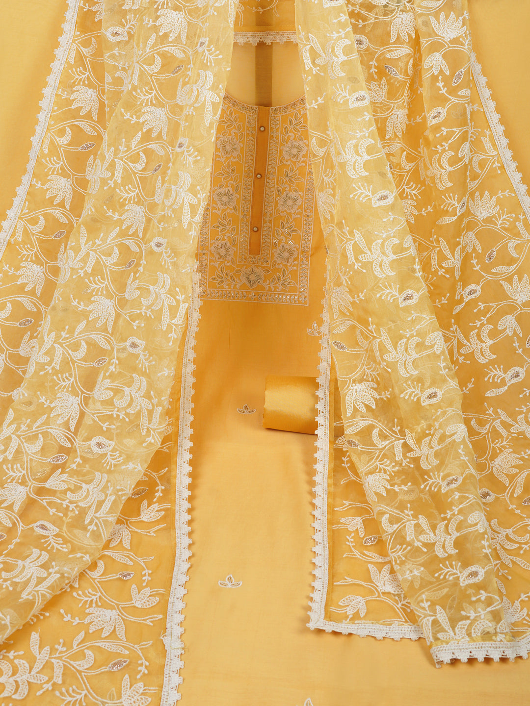 Party Edit- Unstitched suits set is elevated with delicate white thread embroidery and organza dupatta