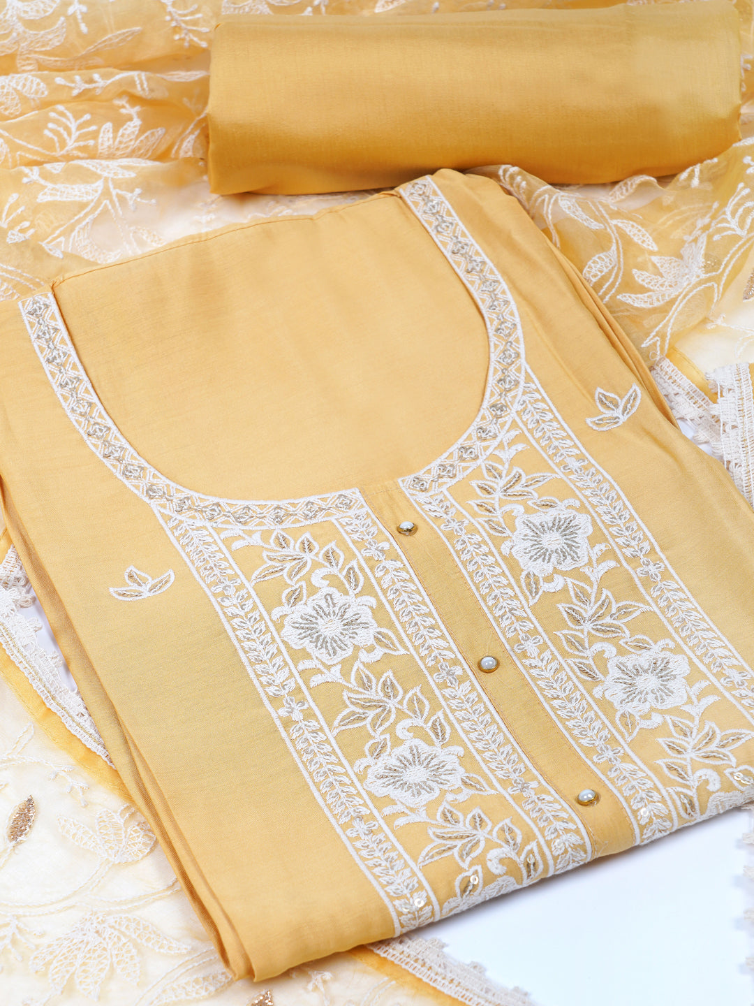 Party Edit- Unstitched suits set is elevated with delicate white thread embroidery and organza dupatta