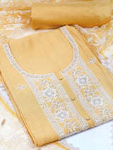 TASYA - Unstitched suits set is elevated with delicate white thread embroidery and organza dupatta.