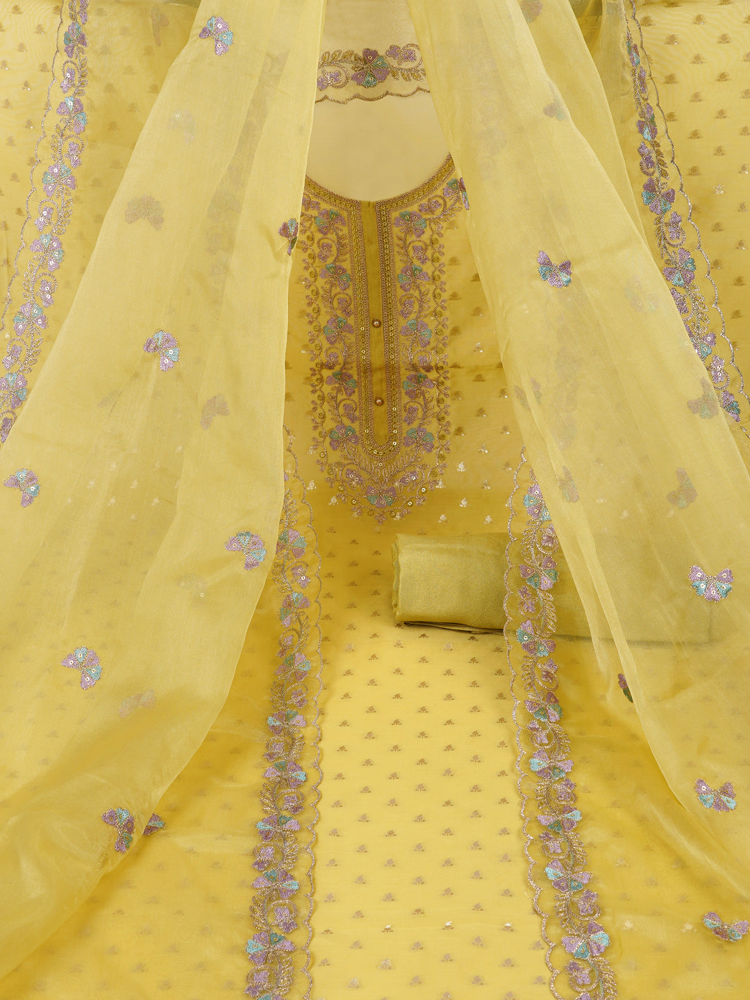 Party Edit- The unstitched dobby chanderi suit set features colourful resham and golden dori embroidery