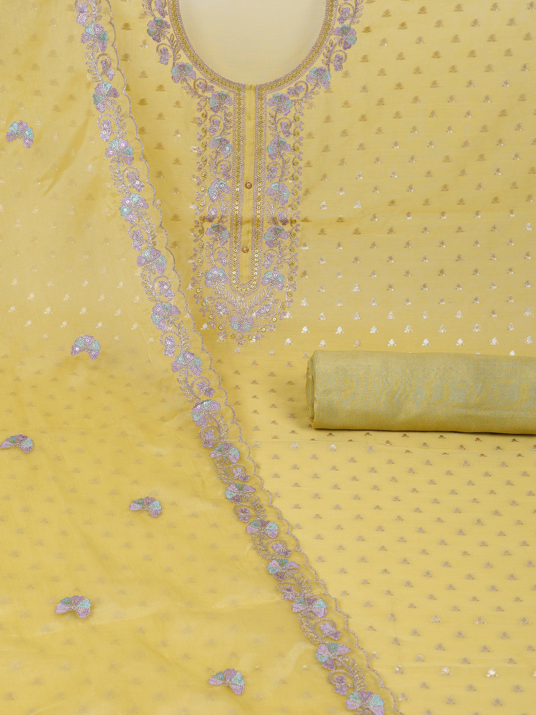 Party Edit- The unstitched dobby chanderi suit set features colourful resham and golden dori embroidery