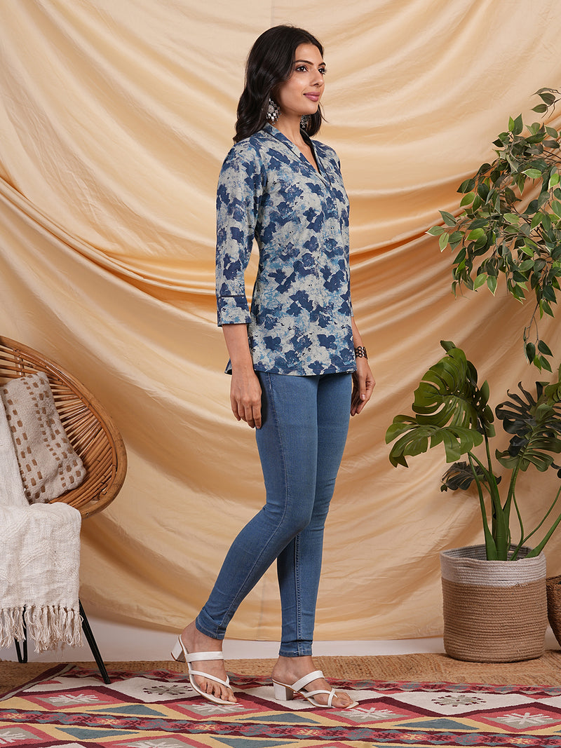 Flared printed cotton V neck top with lace detailing.