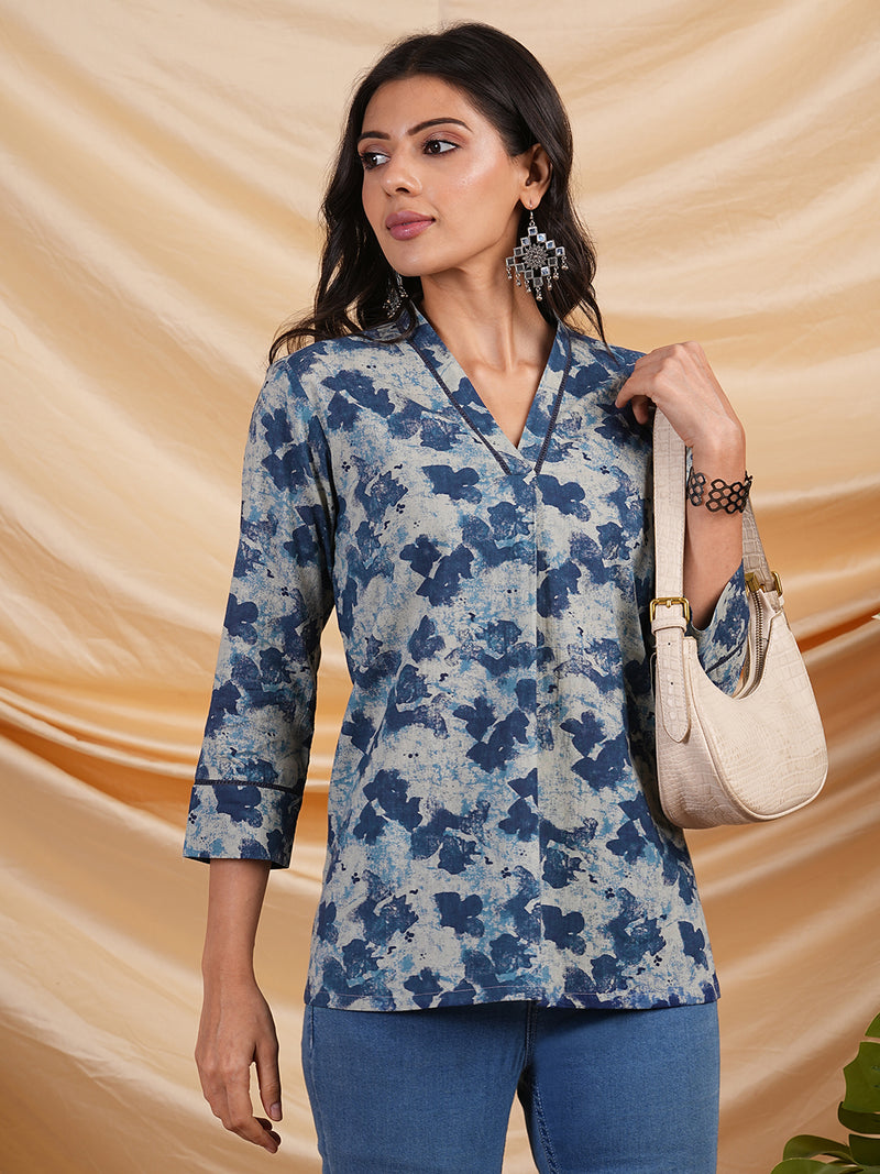 Flared printed cotton V neck top with lace detailing.