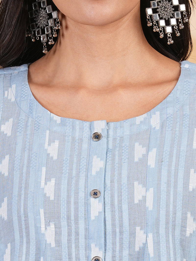 Flared top in woven cotton fabric with a central placket.