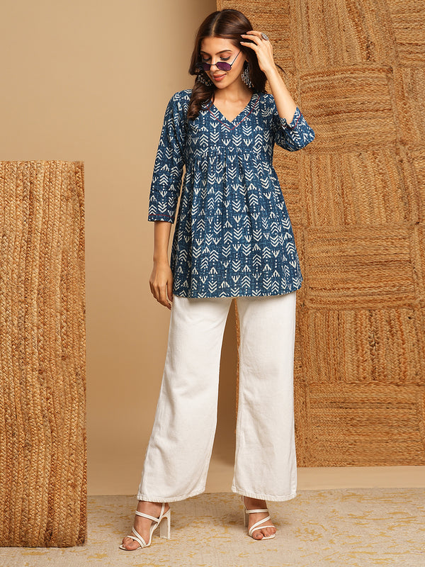 Cotton dhabu print top with gathering and hand embroidery.