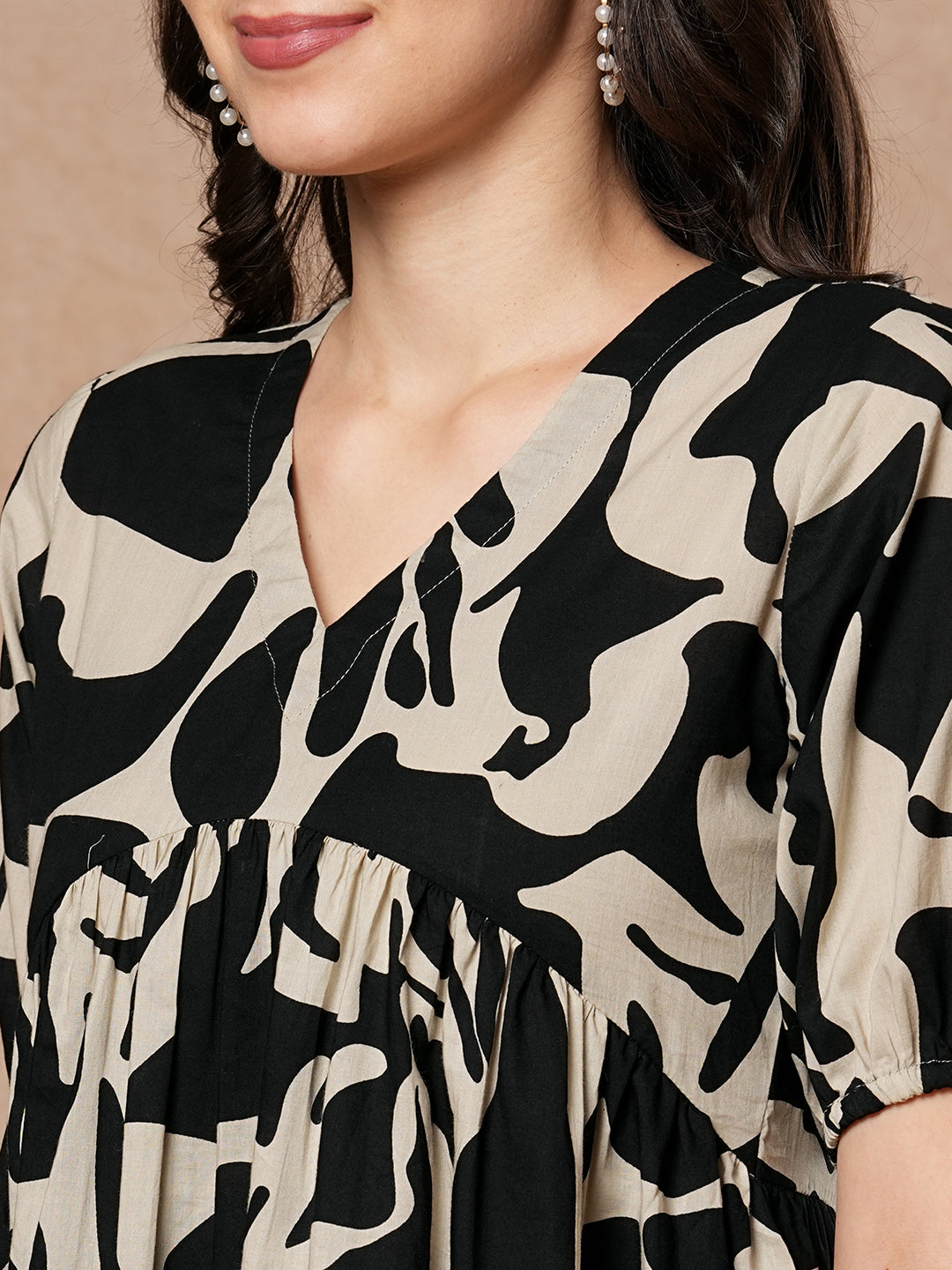 Printed cotton dress with gathering and pocket