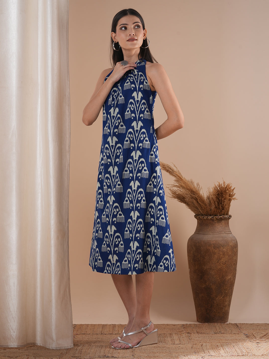 Gathered halter neck dress in a bold ikat print on cotton