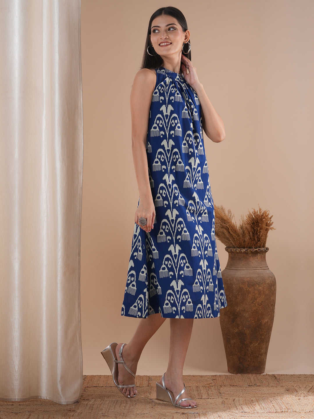Gathered halter neck dress in a bold ikat print on cotton