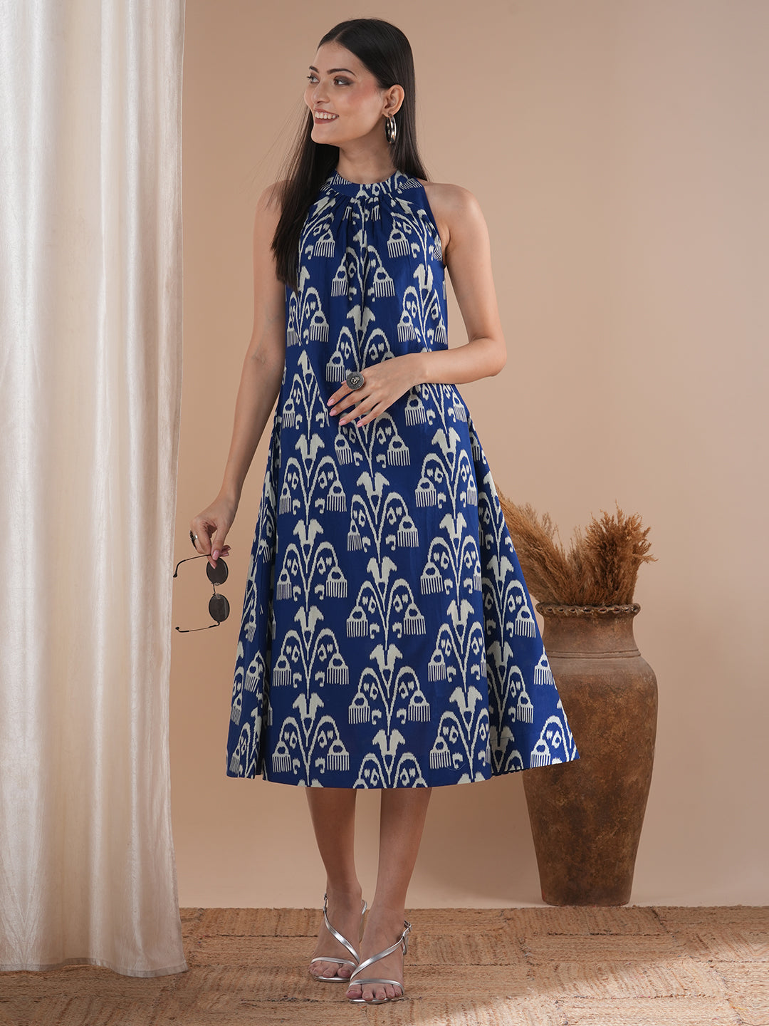 Gathered halter neck dress in a bold ikat print on cotton