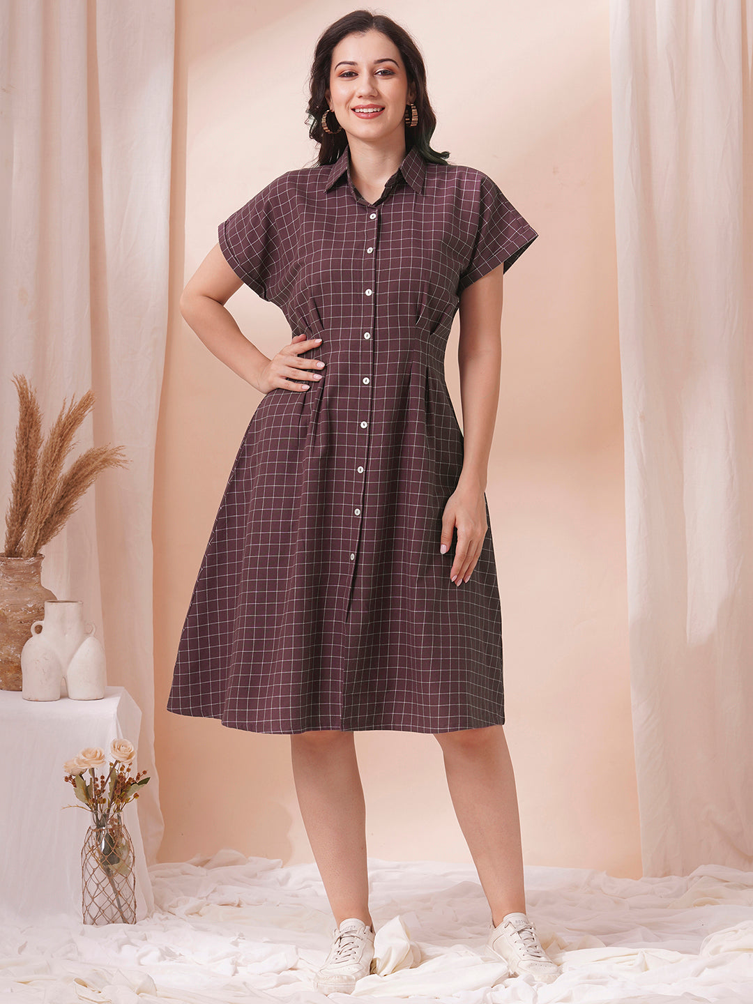 Checkered Fit and Flare dress with extended shoulder sleeve and pocket.