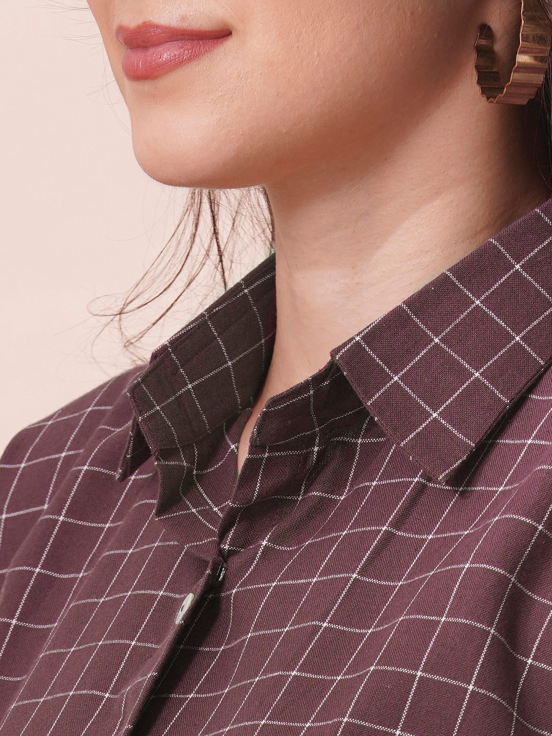 Checkered Fit and Flare dress with extended shoulder sleeve and pocket.