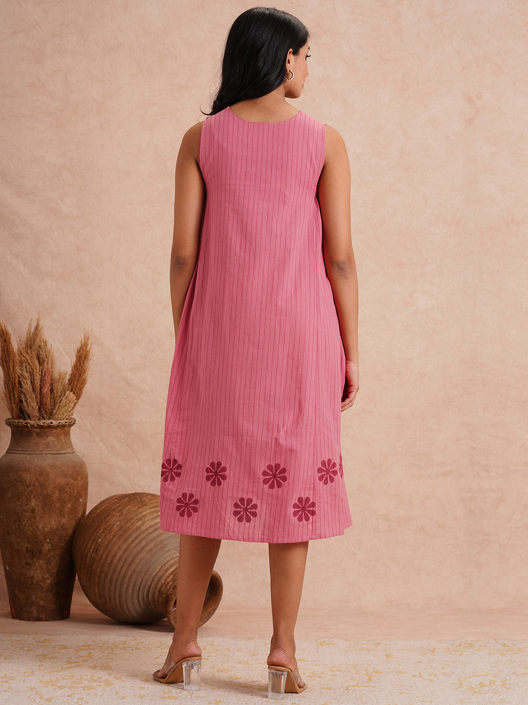 Pocketed dress in woven kantha fabric with elasticated side gathering and block print.