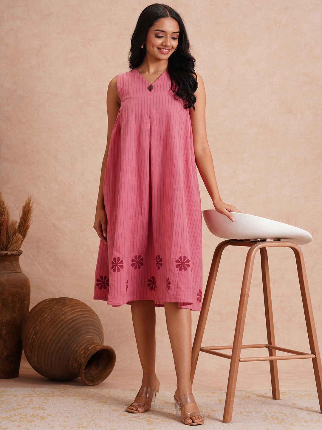 Pocketed dress in woven kantha fabric with elasticated side gathering and block print.