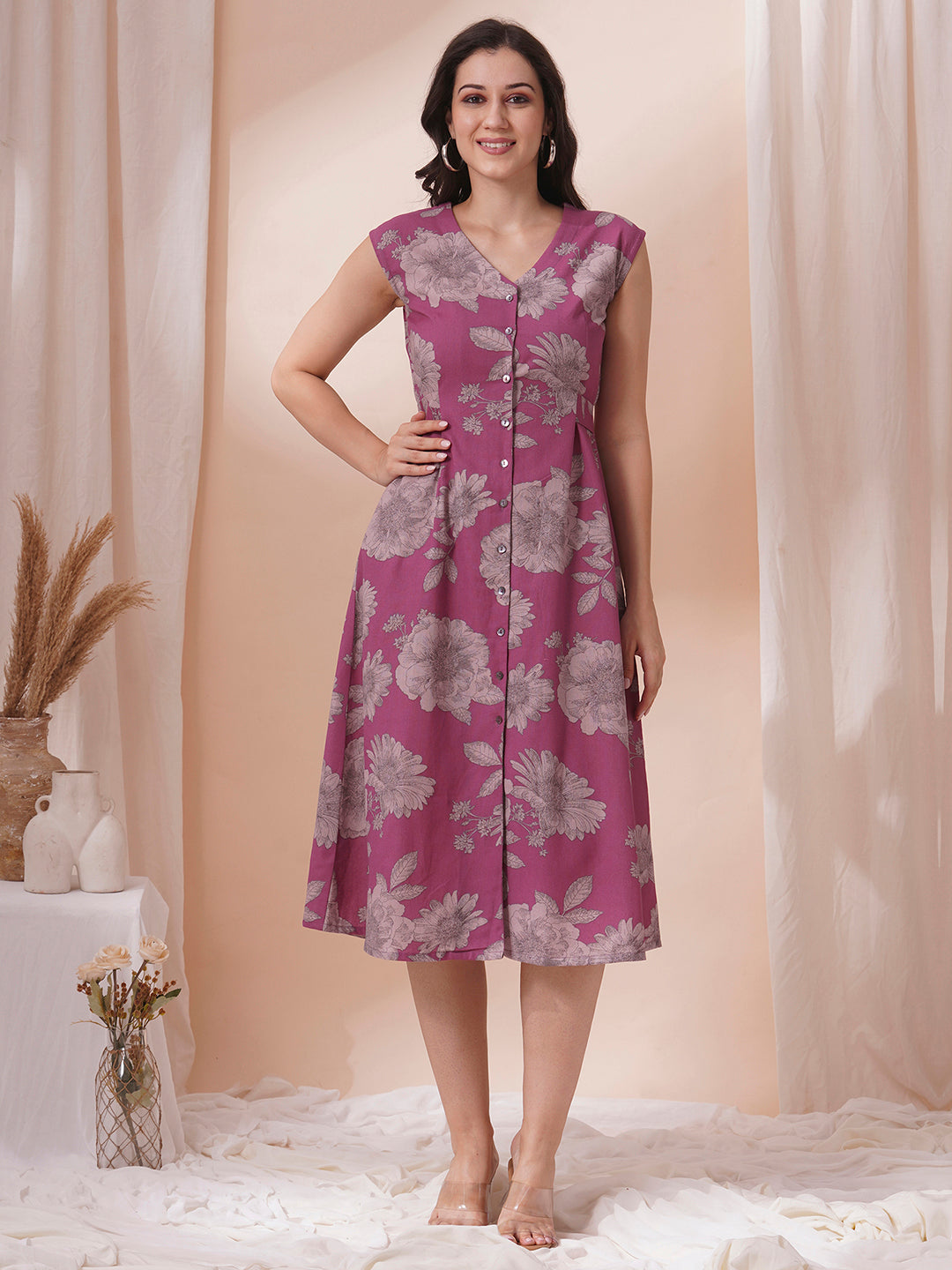 Printed flex extended shoulder dress with functional centre placket and waist tie-up.