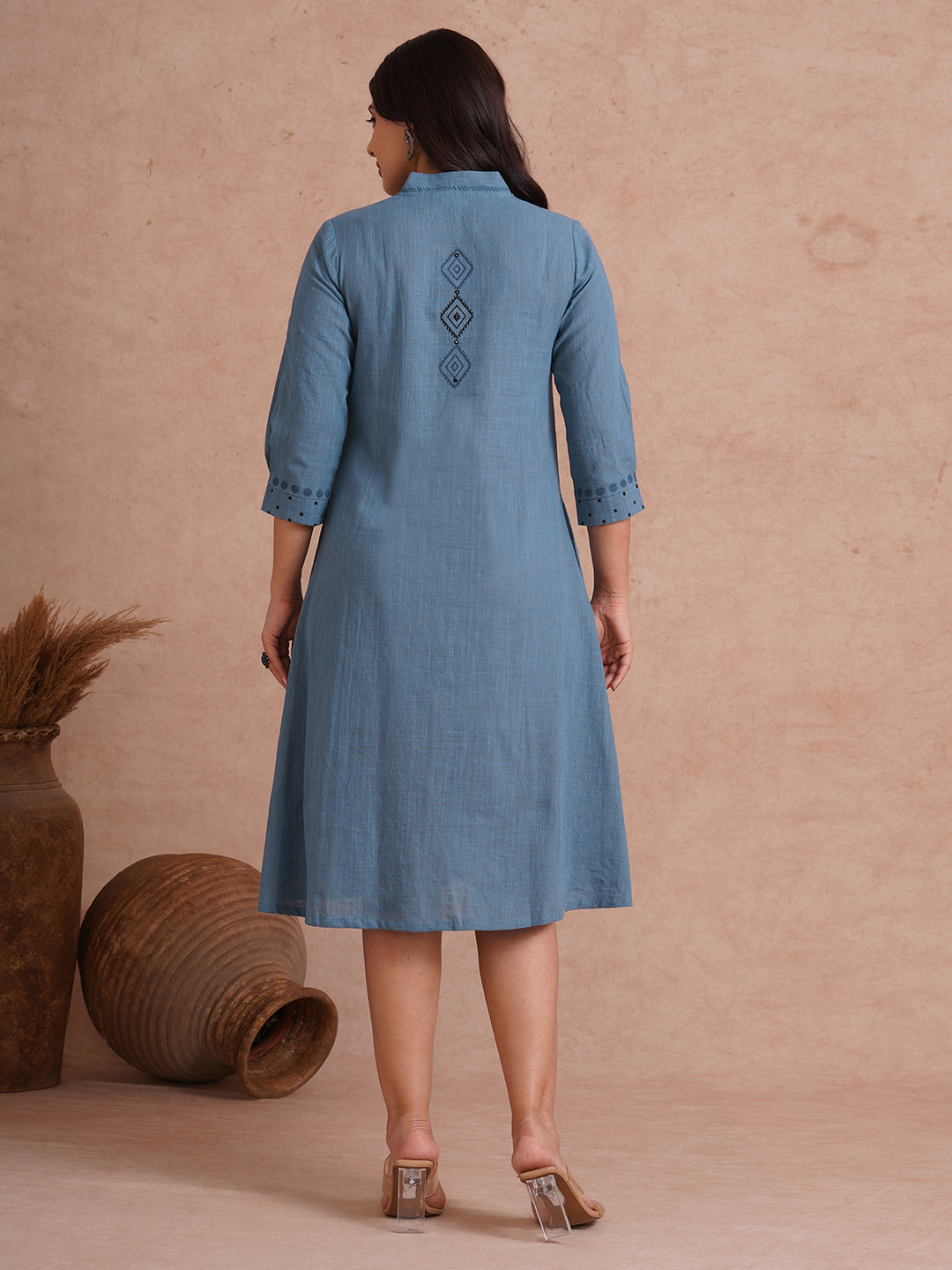 A-line placement block printed dress with centre box pleat in the front and sleeves.