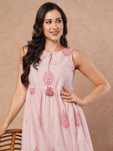 Woven striped and screen printed tiered dress with tie-up on neck with tassels.