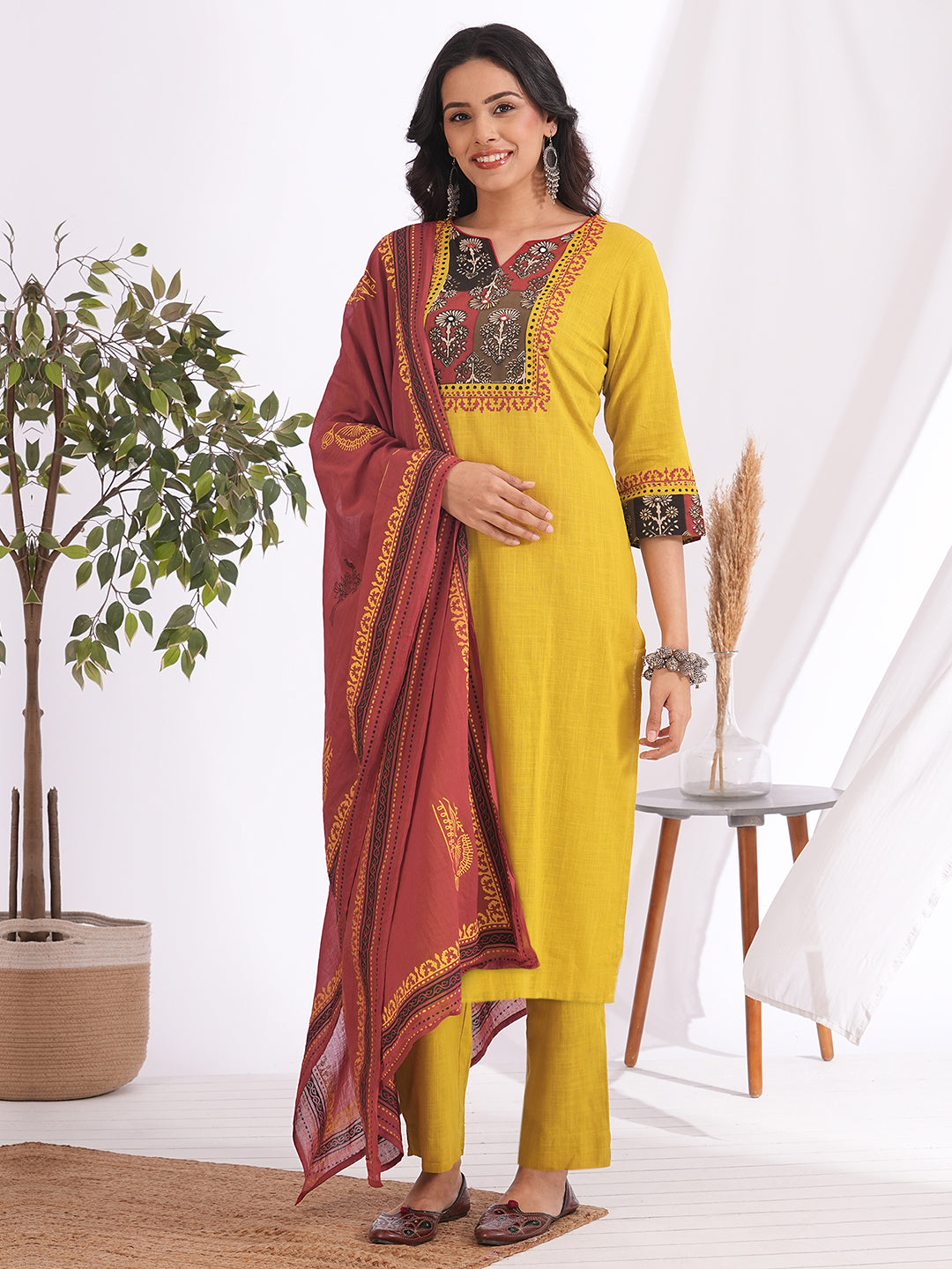 Embroidered Straight Kurta Suit Set with matching solid pants and a printed dupatta.