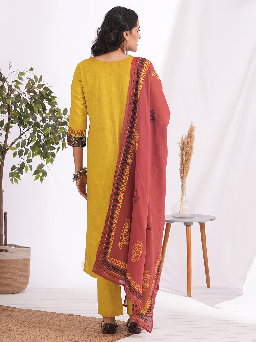 Embroidered Straight Kurta Suit Set with matching solid pants and a printed dupatta.