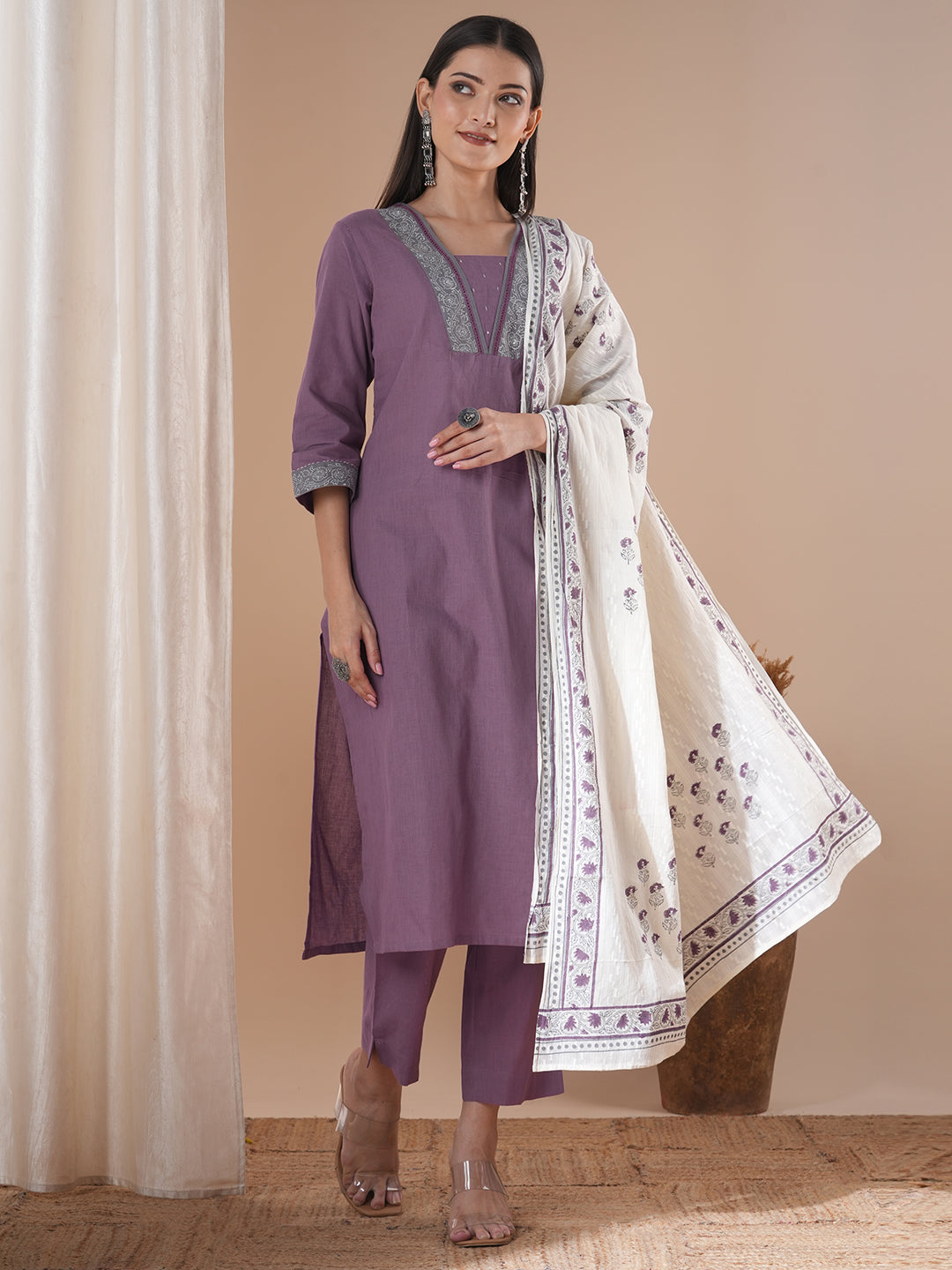 A 3-piece block printed kurta suit set with lace detail and block printed Dupatta