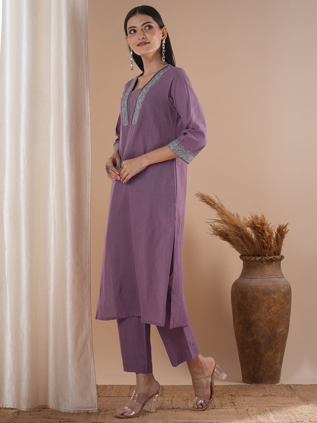 A 3-piece block printed kurta suit set with lace detail and block printed Dupatta