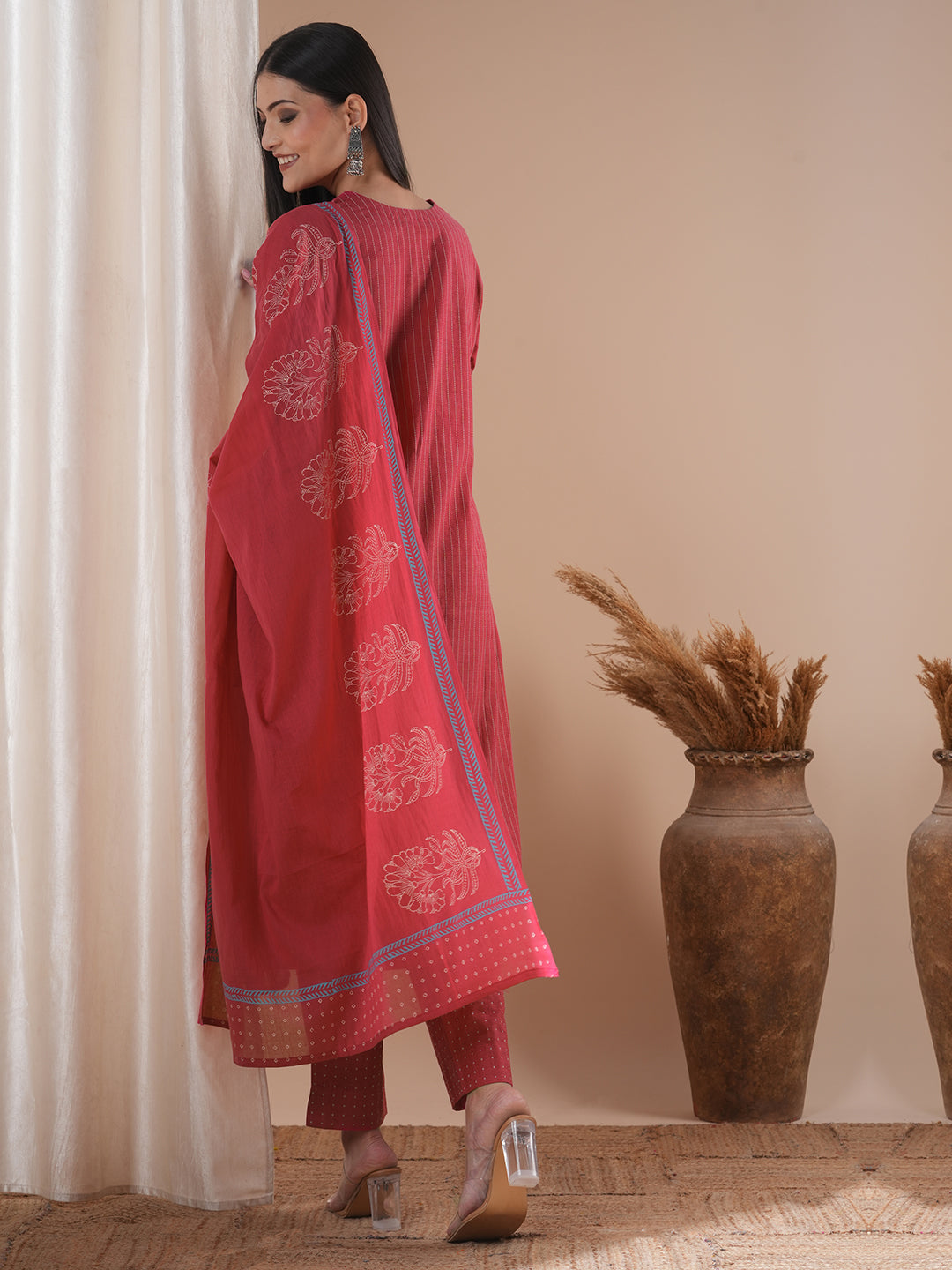 Pink dobby kurta set featuring highlights of contrasting colour embroidery & self bottom
