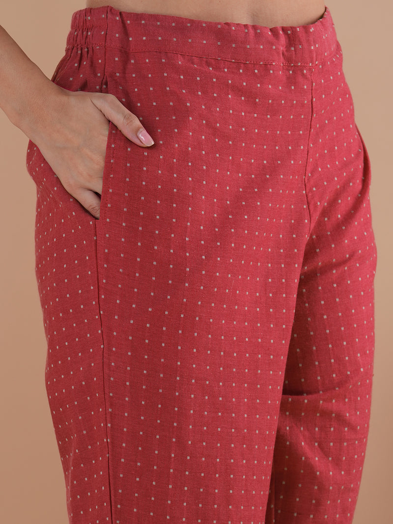 Pink dobby kurta set featuring highlights of contrasting colour embroidery & self bottom