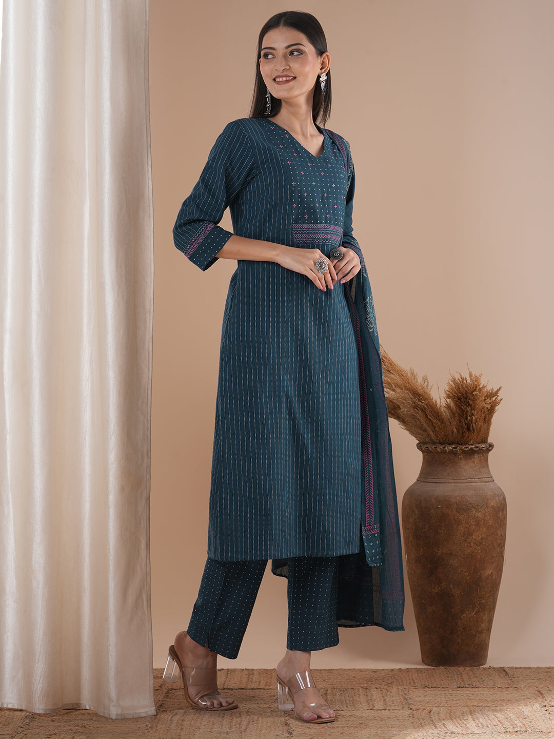 Blue dobby kurta set featuring highlights of contrasting colour embroidery & self bottom