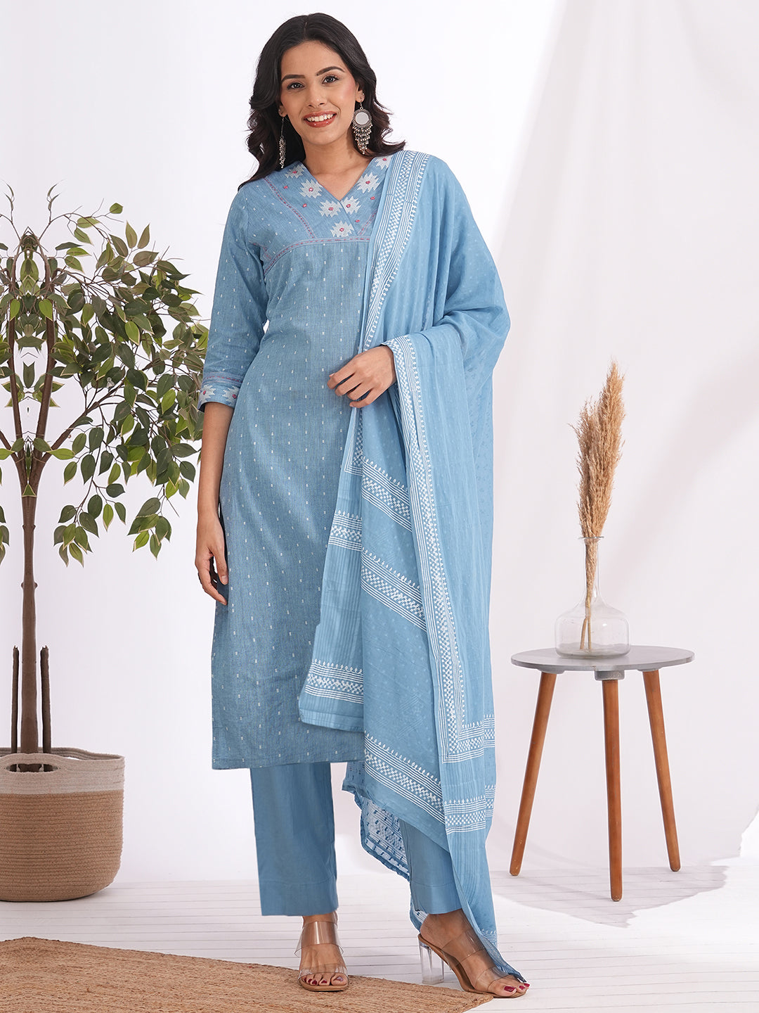 3-piece straight fit suit set mirror worked kurta adorned with a mal block printed dupatta.