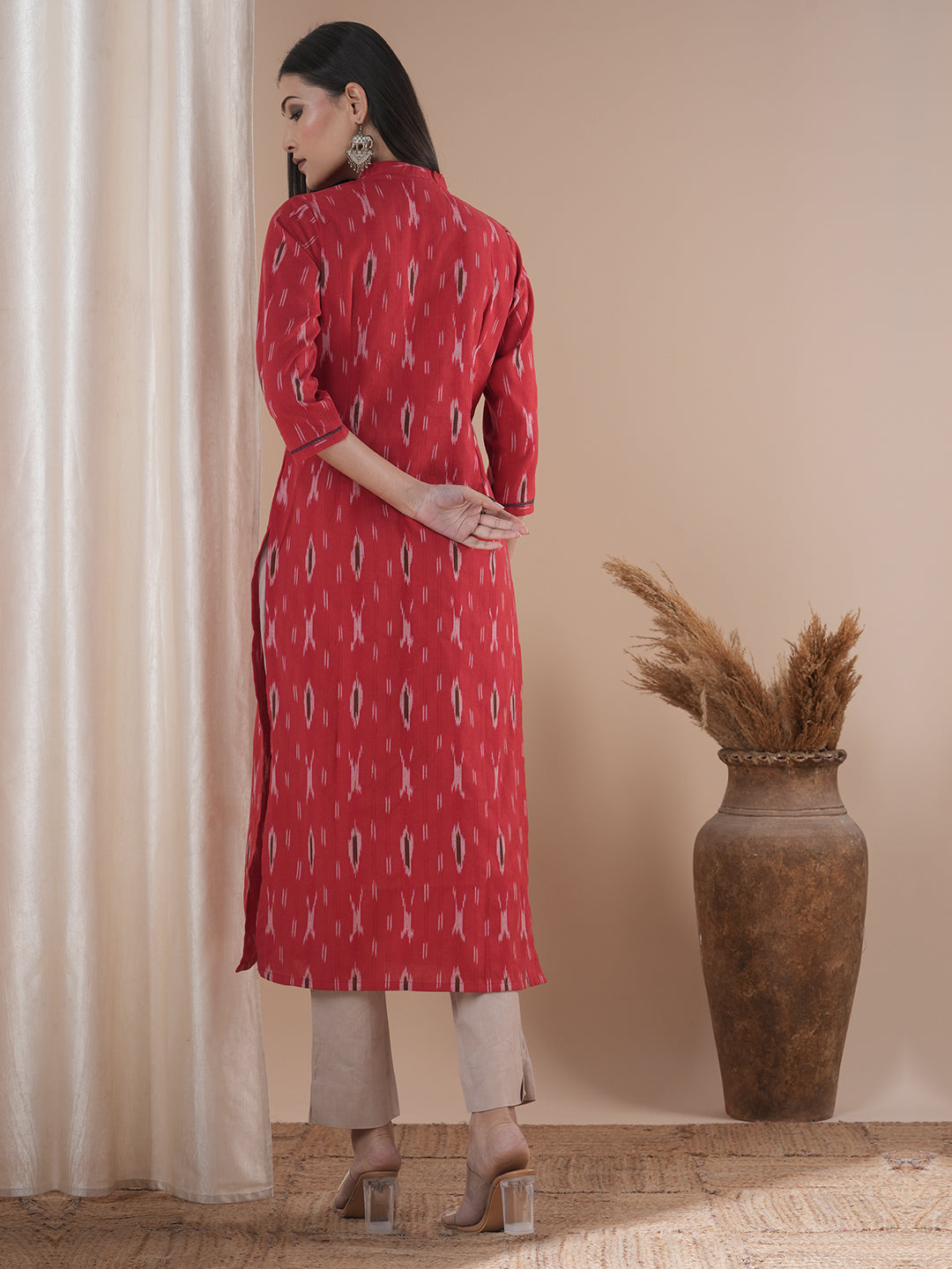Straight fit kurta in cotton ikat fabric with hand embroidery highlight