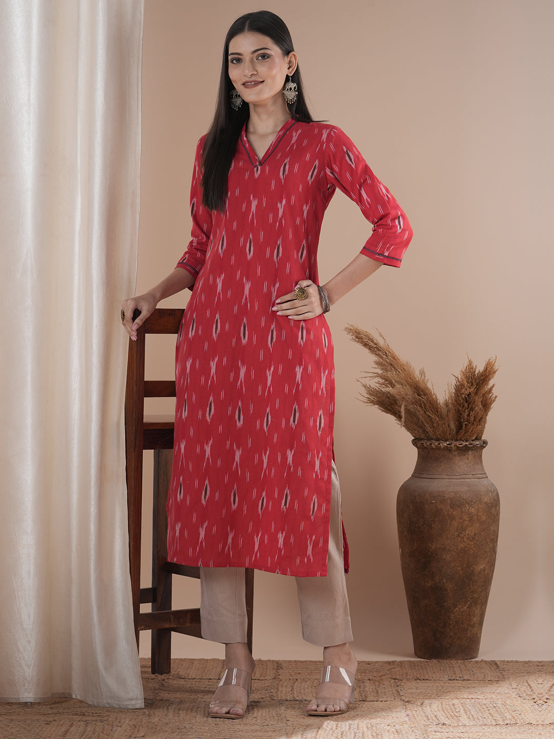 Straight fit kurta in cotton ikat fabric with hand embroidery highlight