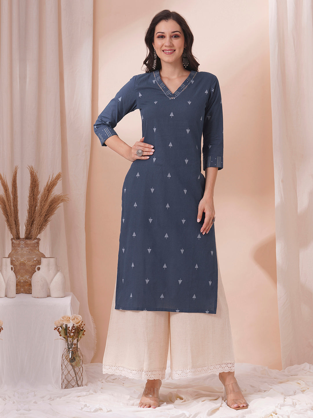 Straight fit cotton dobby kurta with hand embroidery.