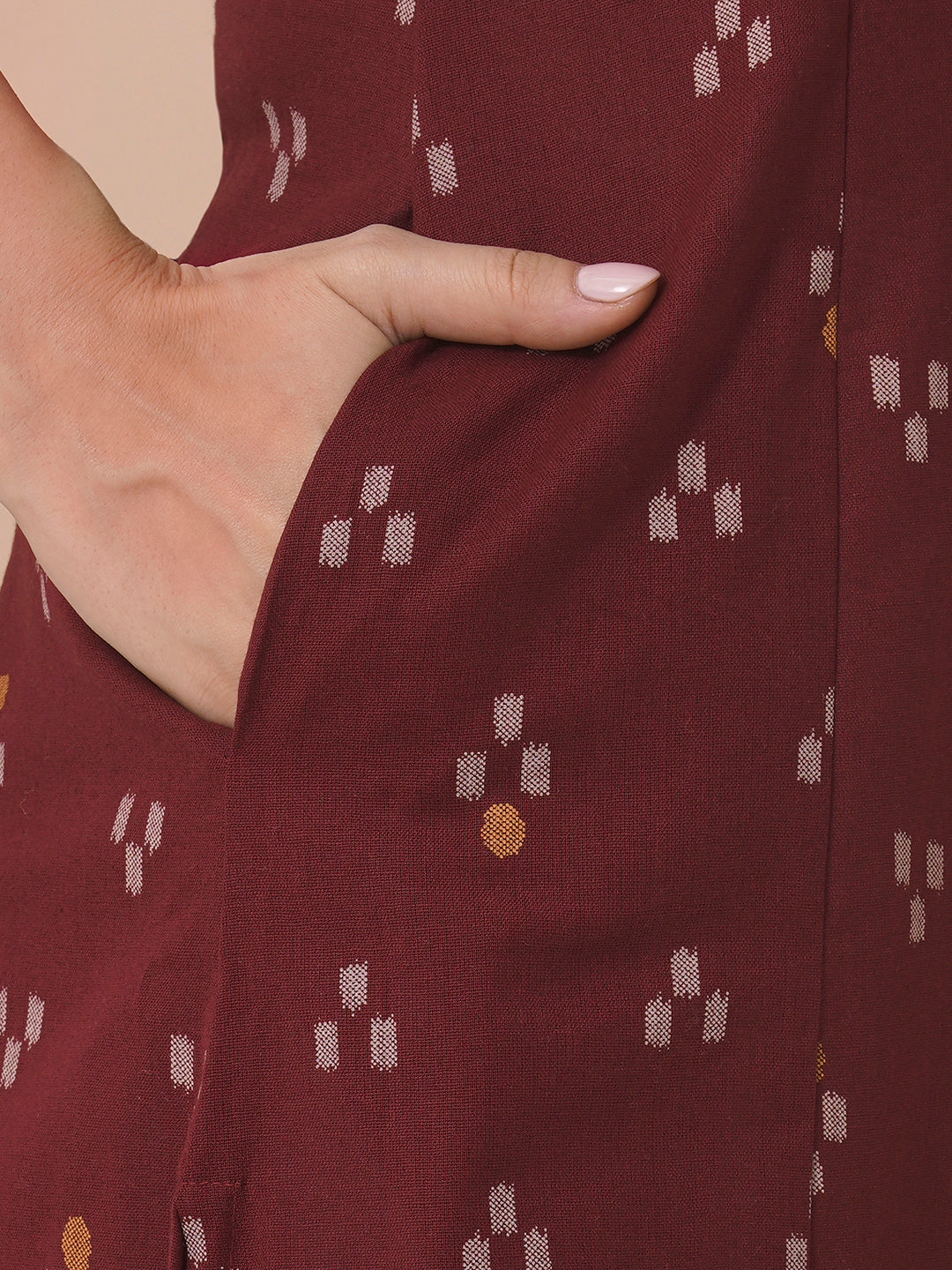 A-Line V-neck kurta in printed cotton flex with hand embroidery.