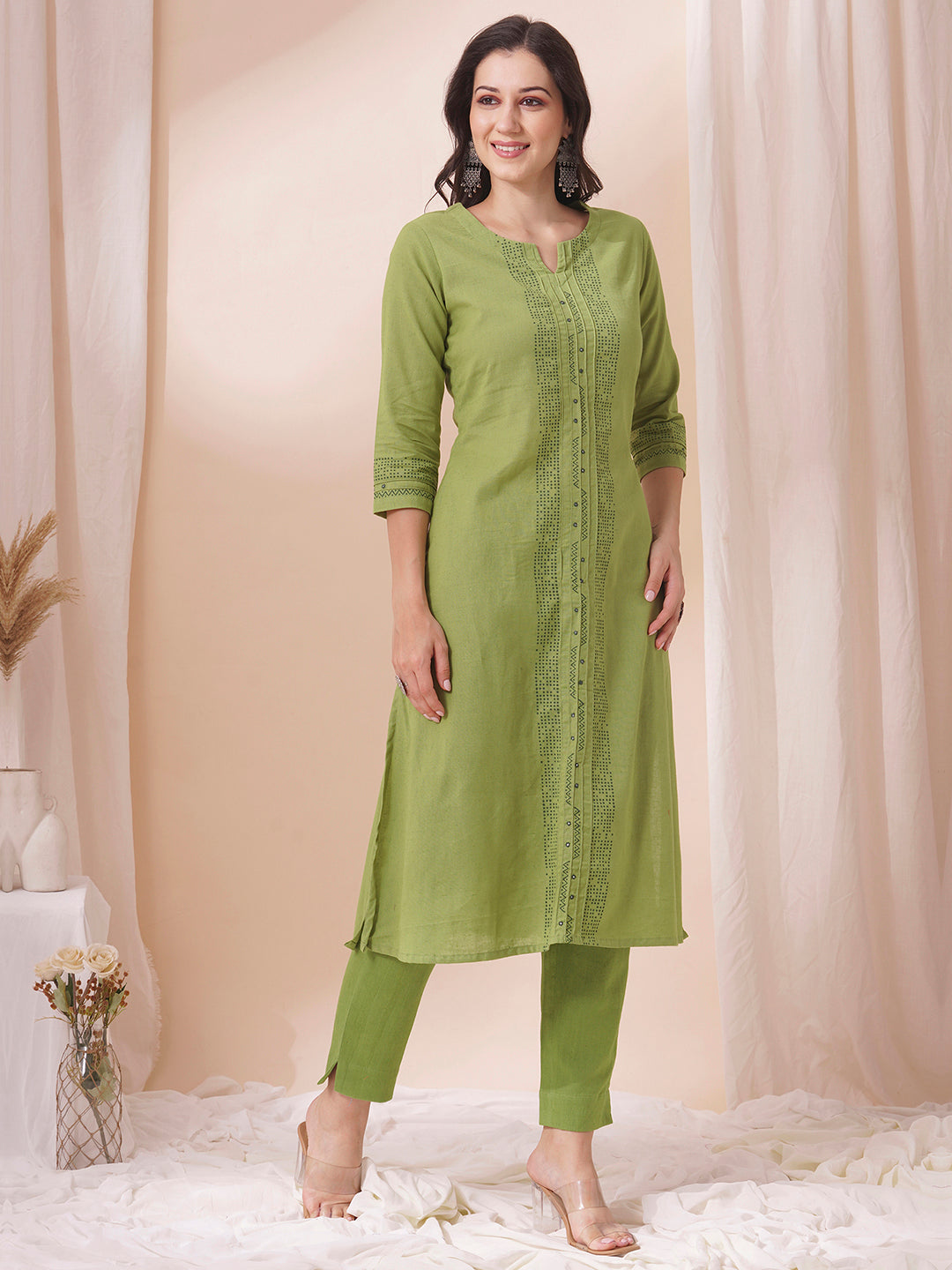 A-Line cotton flex kurta in summery green with hand block print and mirror work.