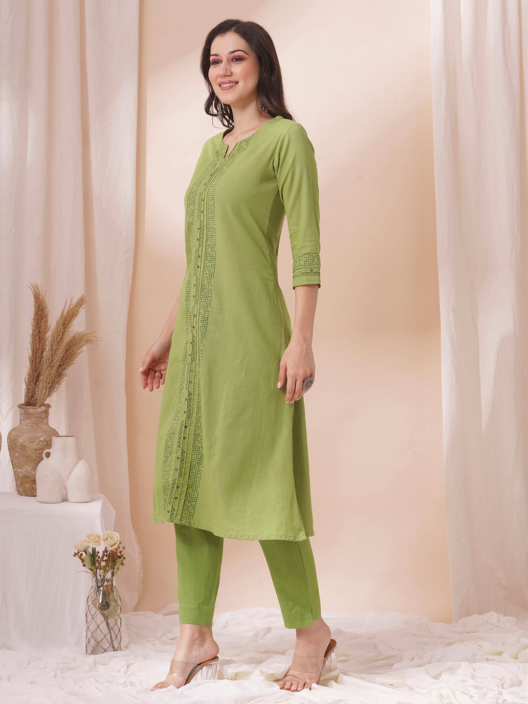 A-Line cotton flex kurta in summery green with hand block print and mirror work.