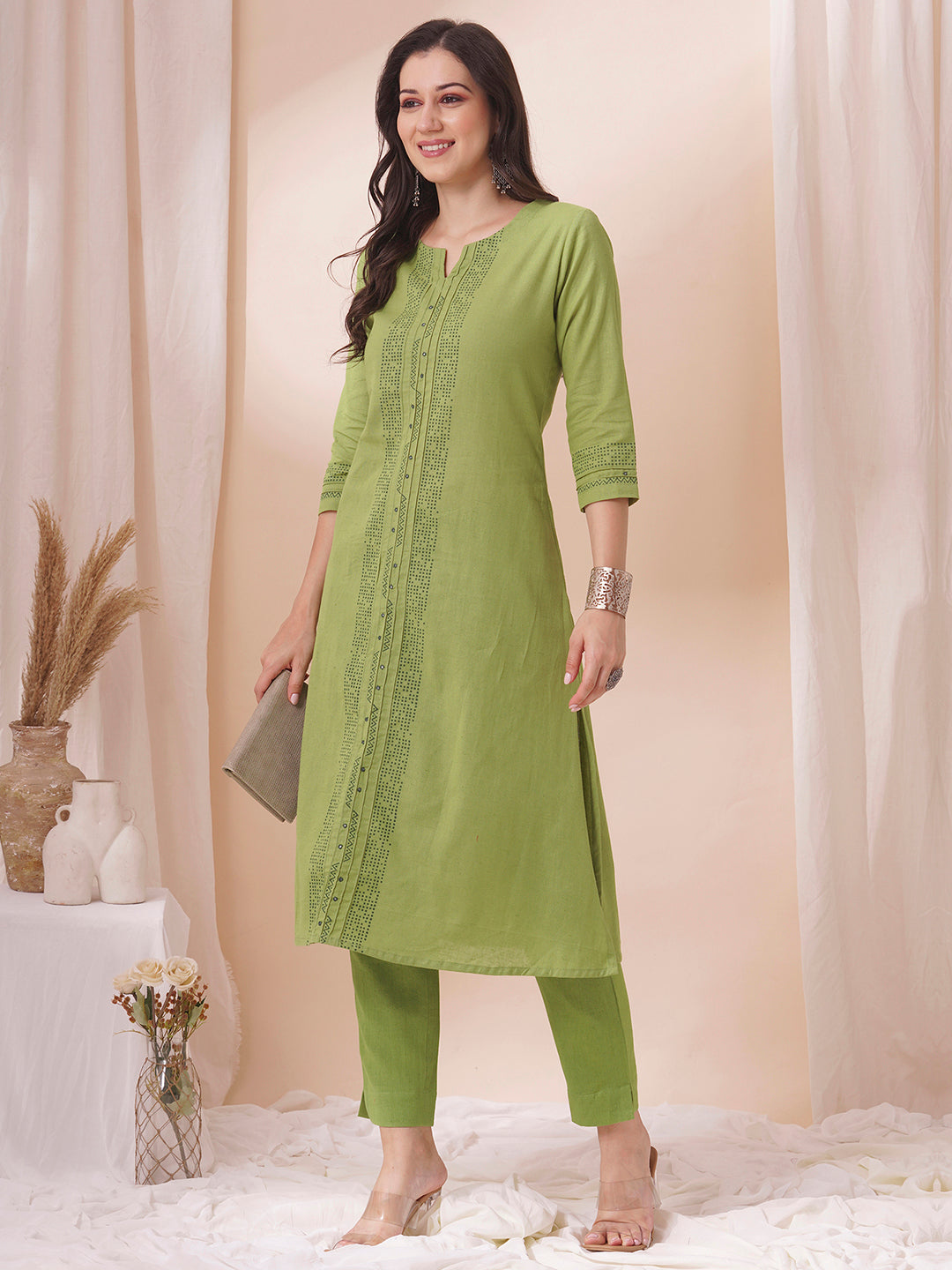 A-Line cotton flex kurta in summery green with hand block print and mirror work.