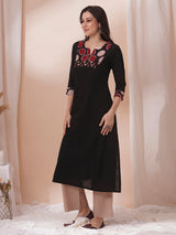 Princess line kurta in black cotton slub paired with hand block and hand embroidery.